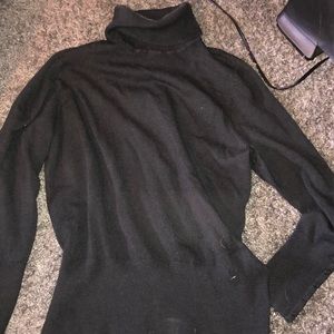 Black turtleneck synched sweater w/ button detail